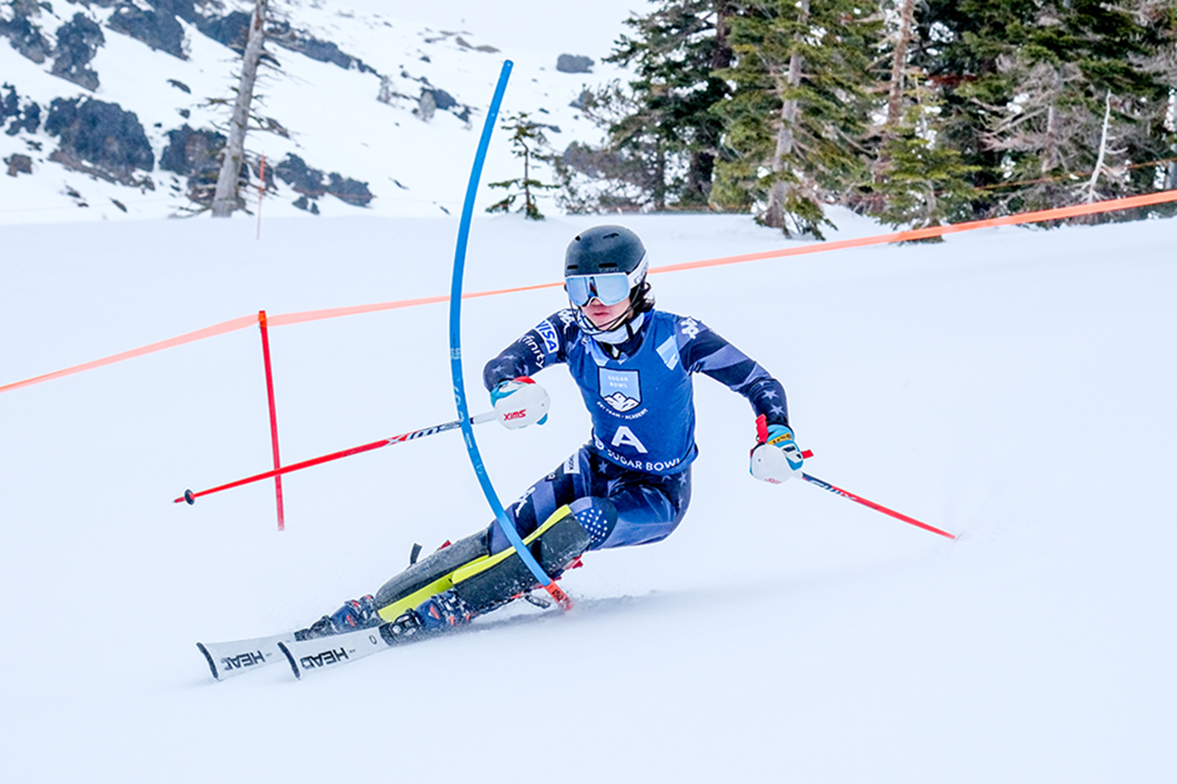Troy Chang skiing down a hill